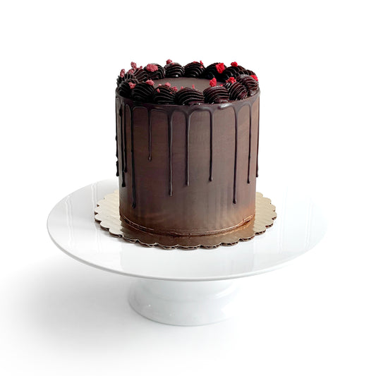 Chocolate Cake filled w/ Raspberry Preserves covered w/ Dark Chocolate Ganache