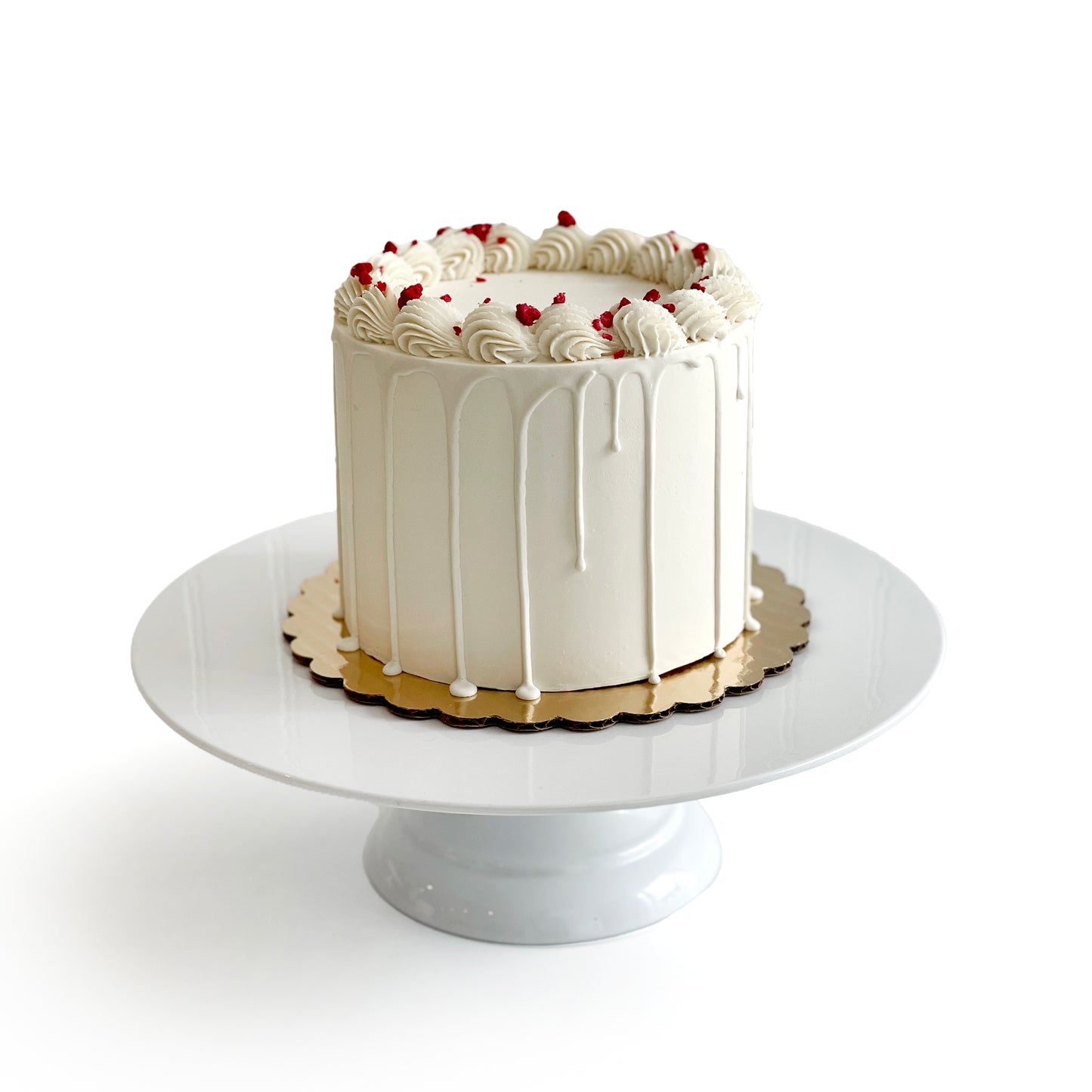 Double Vanilla filled w/ Raspberry Preserves covered w/ White Chocolate Ganache