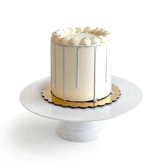 Double Vanilla filled w/Honey Lavender Cream Cheese Buttercream covered w/ White Chocolate Ganache