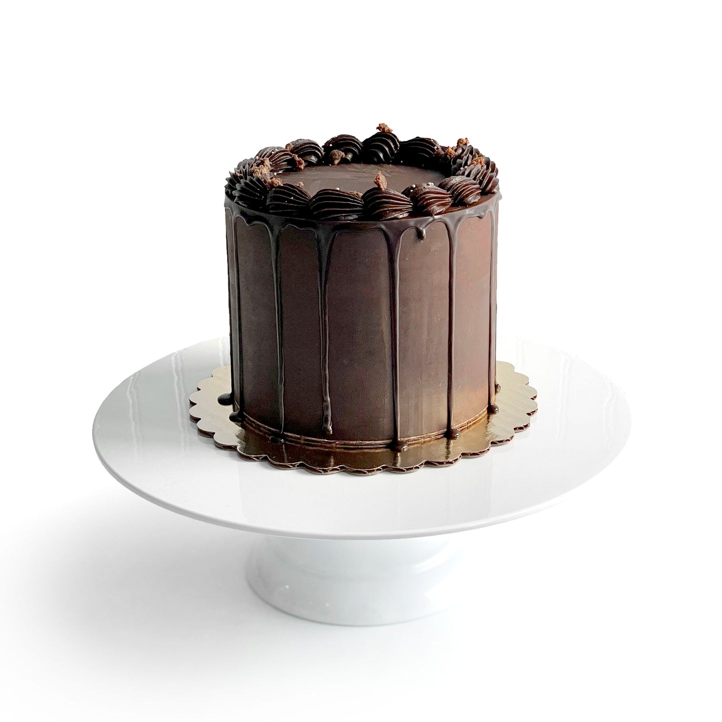 Chocolate Cake filled w/ Chocolate Mousse & covered w/ Dark Chocolate Ganache